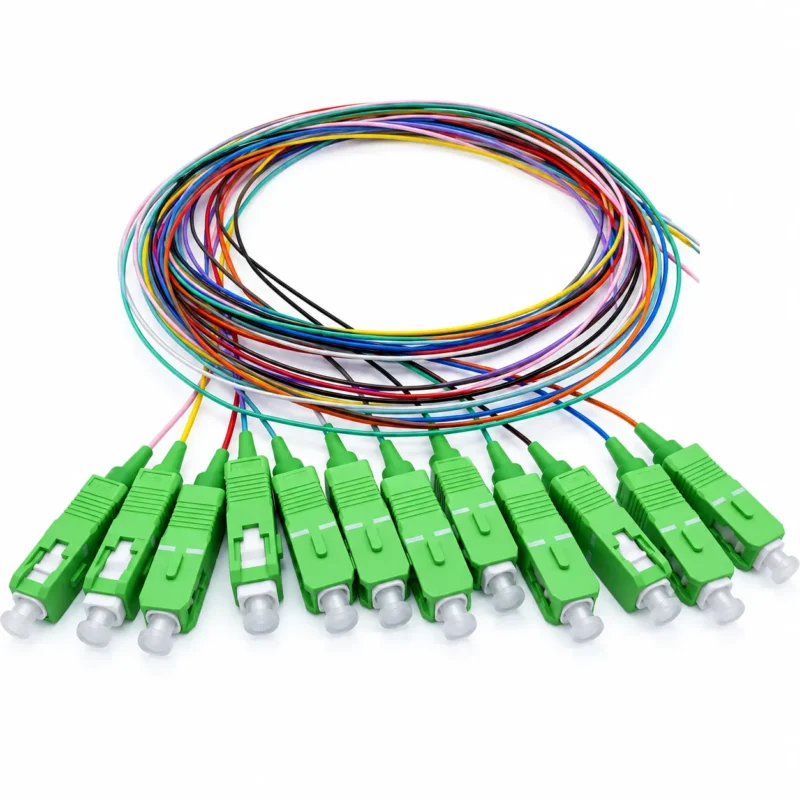 12 fiber SC APC single-mode pigtail with green SC connectors and color-coded coiled fibers